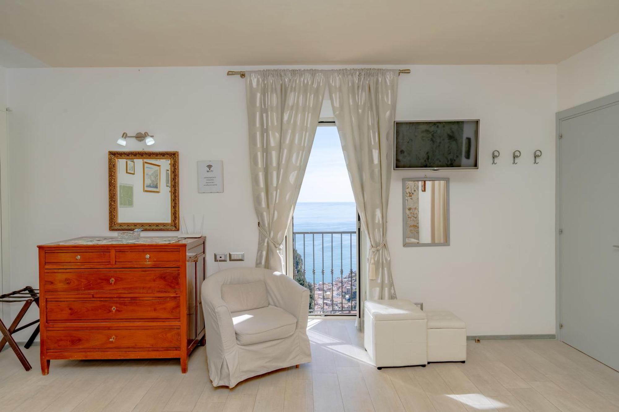 Il Paradiso Sul Mare Apartment Scala Bagian luar foto